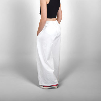 Pantalon Yasmine enfant blanc, vue de dos avec ceinture elastique et jambes amples – patron Kandix