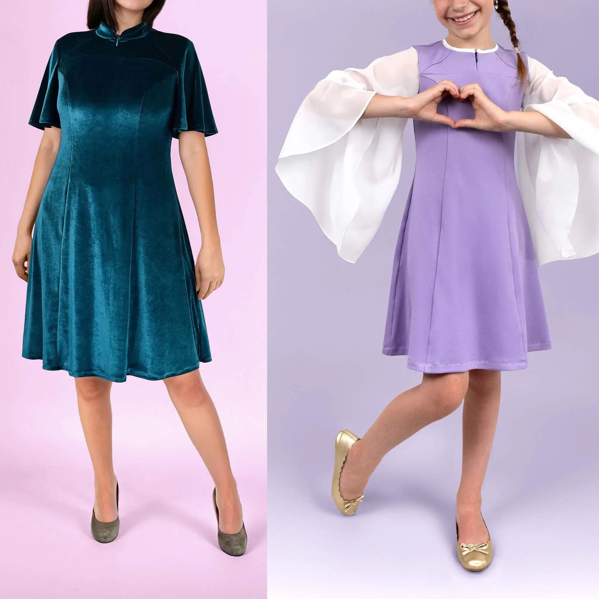 Duo de robes Gaby : une femme en robe en velours vert canard à manches courtes et une fillette en robe lavande aux manches longues et fluides en voile blanc, posant avec un cœur formé avec les mains - patron de couture Kandix